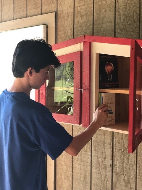 With the help of other Scouts, Landon McIntosh, 17, of Boy Scout Troop 288 created this Little Free Library for Lord of Life Lutheran Church as an Eagle Scout project.